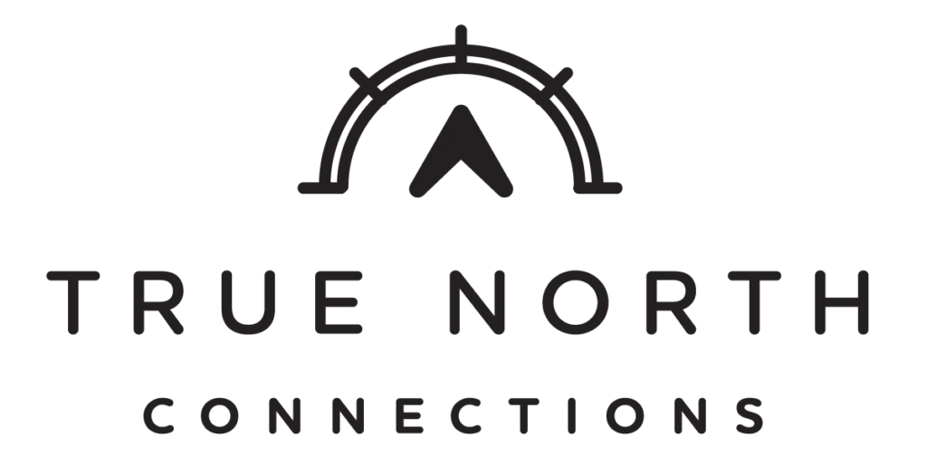 Logo for True North Connection featuring a semicircular arc above a mountain peak and the text 'TRUE NORTH CONNECTION'.